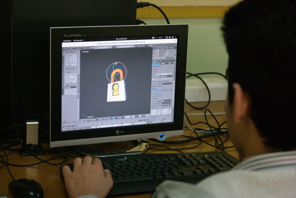 Student from Lebanon Evangelical School tweaks lock in Blender with Fedora Workstation
