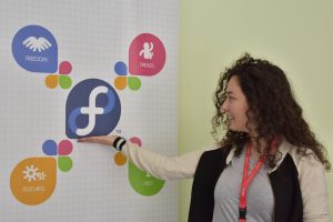 Fedora Ambassador Anxhela Hyseni at the Fedora community table at Linux Weekend 2017 in Tirana, Albania