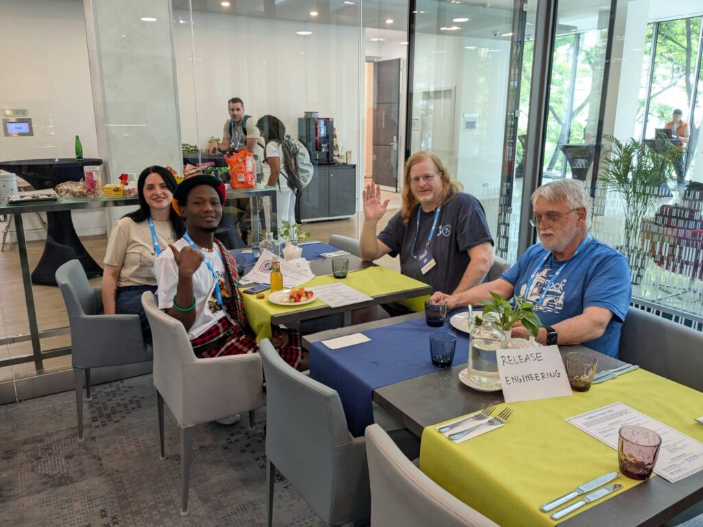 Jona, Cornelius, Kevin and Peter pose for a photo during the Mentor Summit Lunch hour time.
